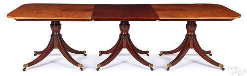 Regency mahogany triple pedestal dining table