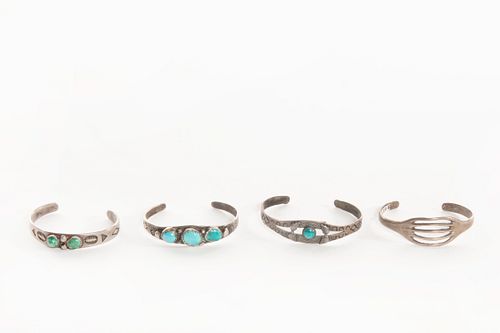 A Group of Four Navajo Silver and Turquoise Child's Bracelets