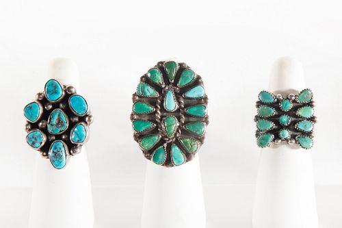 A Group of Three Navajo and Zuni Silver and Turquoise Rings