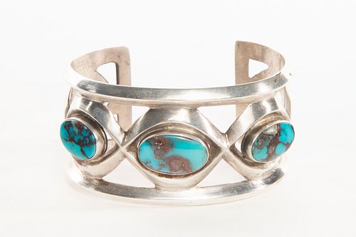 A Navajo Three Stone Bisbee Turquoise and Silver Cuff Bracelet
