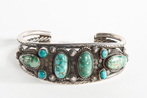 A Navajo Eight Stone Turquoise and Silver Cuff Bracelet, ca. 1940