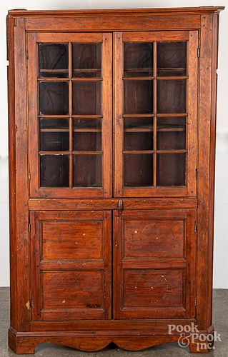 Pine one-piece corner cupboard, early 19th c.