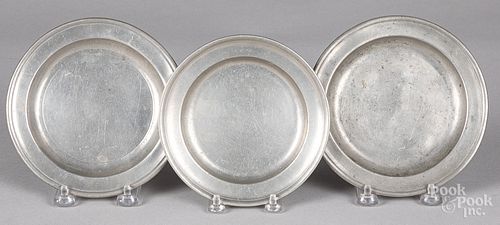 Three small pewter plates