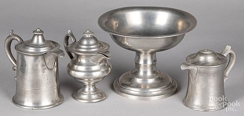 Three pewter syrup pitchers