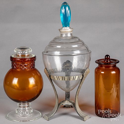 Three glass apothecary jars