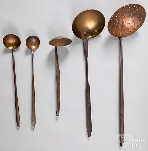 Five wrought iron, brass and copper ladles