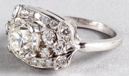14K white gold ring with center diamond