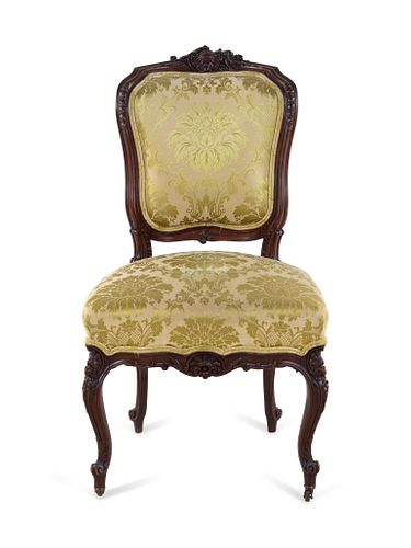 A Louis XV Carved Walnut Side Chair