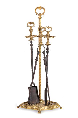 A Set of French Gilt Bronze Fireplace Tools