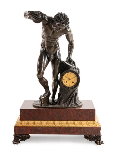 A Continental Patinated Bronze Figural Mantel Clock
