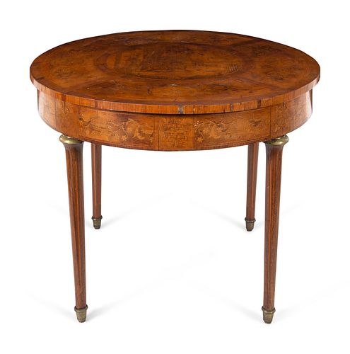 A Continental Marquetry Decorated Center Table