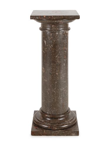 A Neoclassical Carved Marble Pedestal