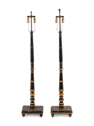 A Pair of Regency Style Parcel Gilt and Ebonized Floor Lamps