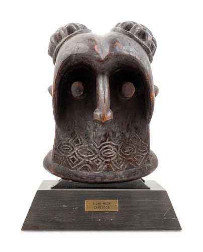 A Bamileke Carved Wood Helmet Mask