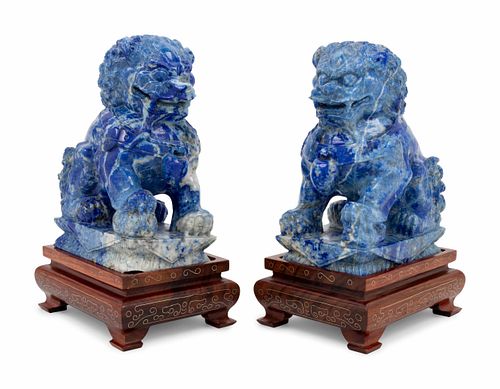 A Pair of Carved Lapis Lazuli Buddhist Lions