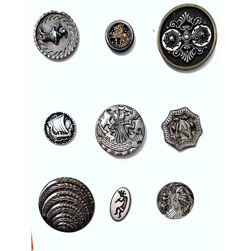 A Small Card Of Assorted White Metal Buttons