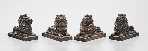 Group of Four Metal Lions
