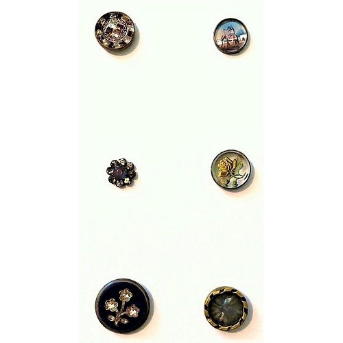 A Small Card Of Glass And Under Glass In Metal Buttons