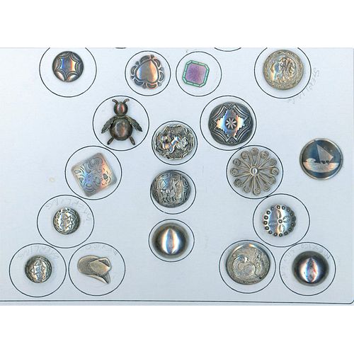 A Small Card Of Assorted Silver Buttons