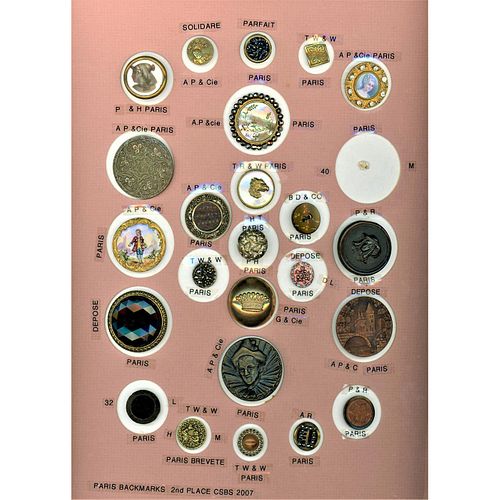 A Card Of Assorted Material Buttons Including Pearl