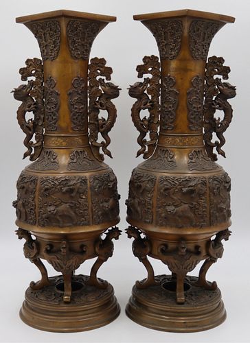 Pair of Japanese Meiji Bronze Vases with Dragons.
