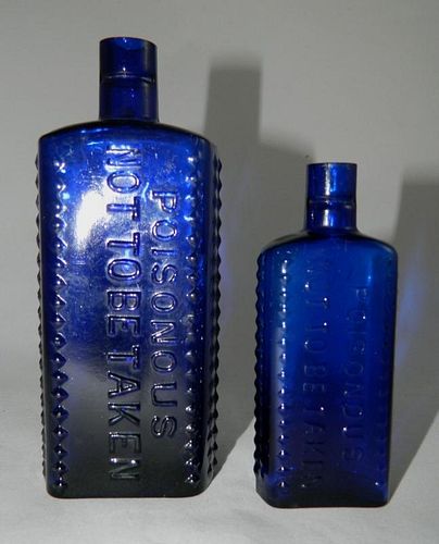 2 Poison cobalt rectangle bottles