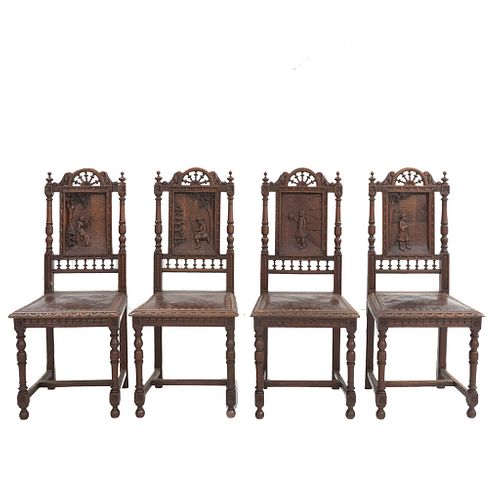 Lote de 4 sillas. Francia. Siglo XX. Estilo Bretón. En talla de madera de roble. Con respaldos semiabiertos y asientos tipo piel.