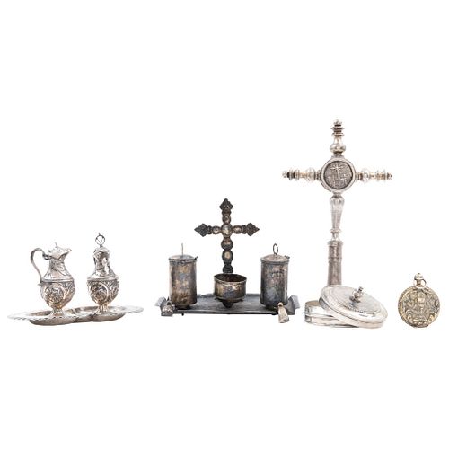 Lot of Religious Items, Mexico, 19th century, Silver, Includes: Altar cruet, tabernacle, chrismatory, and crucifix-reliquary. Pieces: 5.
