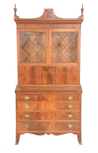 Federal Mahogany Secretary Desk in two parts, upper section with finials over two glazed doors over three doors, set on lower sectio...