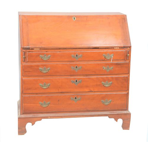 Chippendale Cherry Desk having slant lid over four drawers set on bracket feet, interior with shell carved door flanked by banks of ...