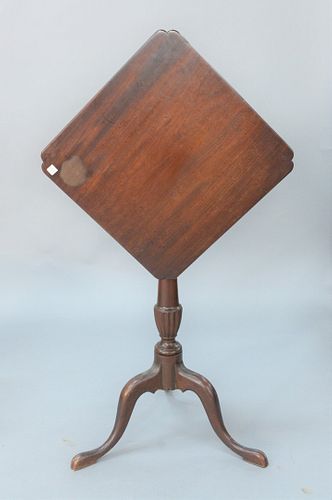 Federal Mahogany Kettle Stand with tip, top having notched corners set on turned shaft with carved urn on tripod base feet with carv...