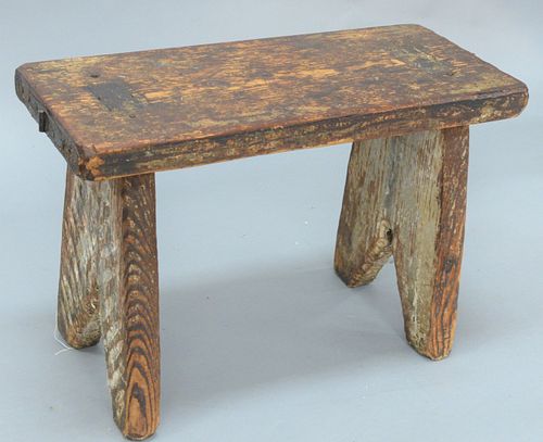 Folk Art Bench with carved and paint decorated ends in red, grey, and black.
height 16 1/2 inches, top 11 1/2" x 25".