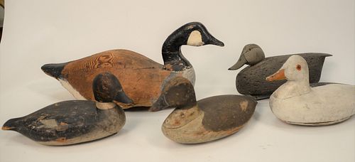 Group of Five Decoys to include John A Welles Jr. Black Duck with cork body and wooden head, inscribed Winter of 1977 #2 of 17; Cana...