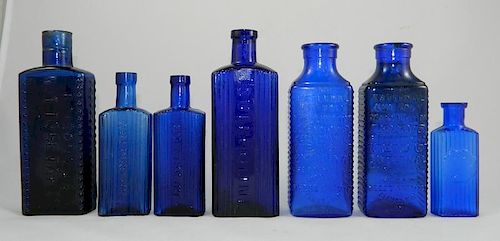 Poison - 7 rectangular cobalt bottles