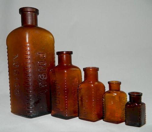 5 Amber poison bottles