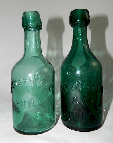 Mineral water - 2 emerald green bottles