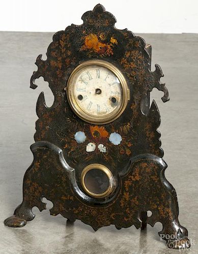 Cast iron front shelf clock with mother-of-pearl inlay, 16 1/2'' h.