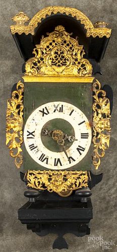 Dutch Frisian wall clock with a gilt surround and ebonized wall bracket, overall - 24'' h.