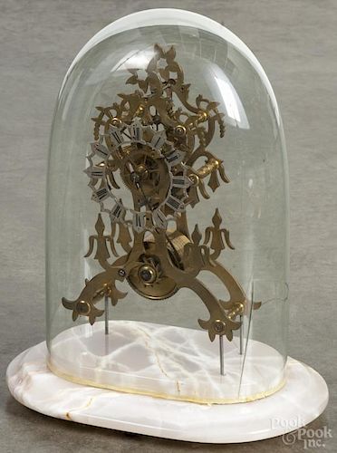 Brass skeleton clock under a dome with a fusee movement, overall - 15 1/2'' h.