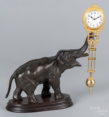 Junghans bronze elephant swinger clock, 11 1/4'' h.