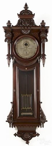 Reproduction E. Howard & Co., Boston carved mahogany regulator clock with a stamped movement