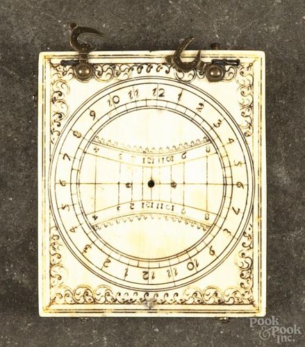 Ivory pocket sundial, 19th c., 2 1/2'' x 3''.