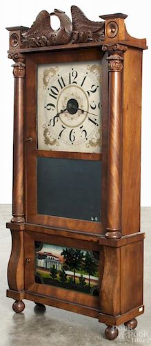 Forestville mahogany double decker mantel clock with a carved eagle crest, 38'' h.
