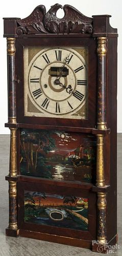 Upton, Merrimans & Co. mahogany triple decker clock with a carved eagle crest, 35 1/2'' h.