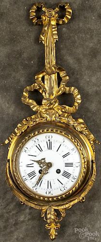 French ormolu wall clock, 19th c., with an enamel dial and Vincenti works, 22 3/4'' h.