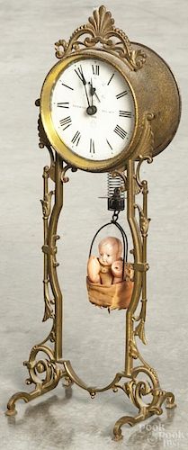 Ansonia, jumper #2 bobbing doll shelf clock with a celluloid doll pendulum, 14 1/2'' h.