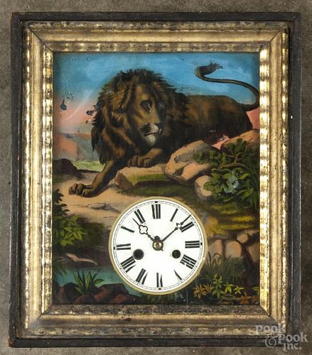 German ebonized picture frame clock with reverse painted glass of a lion, 14 1/2'' h.