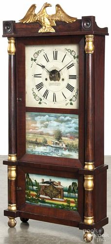 Forestville Clock Co. mahogany triple decker mantel clock with a gilt eagle crest, 37'' h.