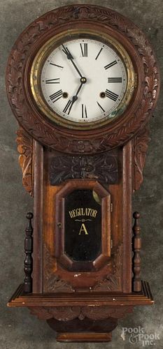 Walnut regulator A wall clock, 28 1/2'' h.
