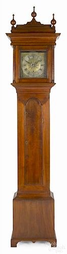 Pennsylvania Chippendale walnut tall case clock, late 18th c., with a brass and silver dial